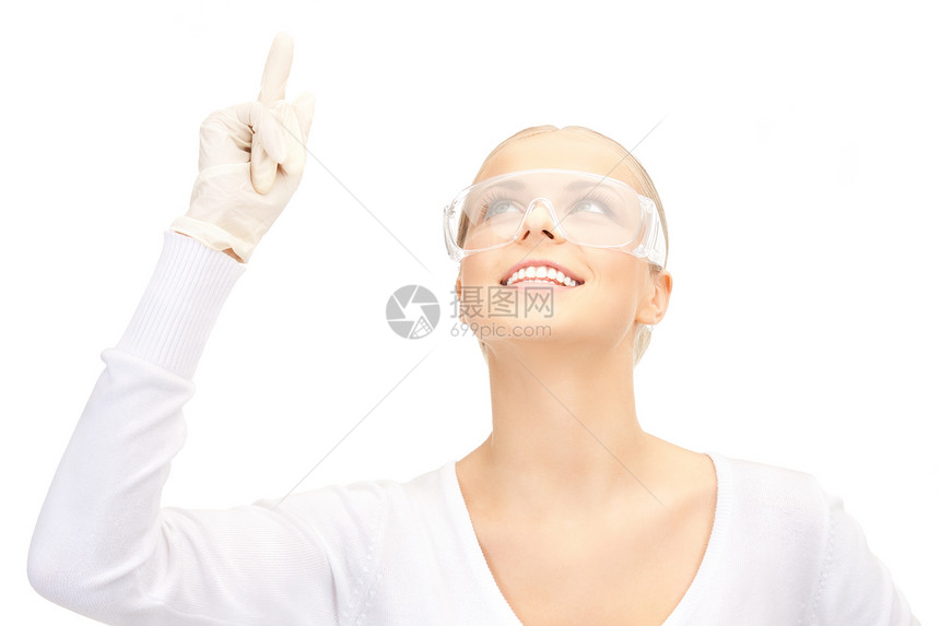 戴防护眼镜手套的女人的照片图片