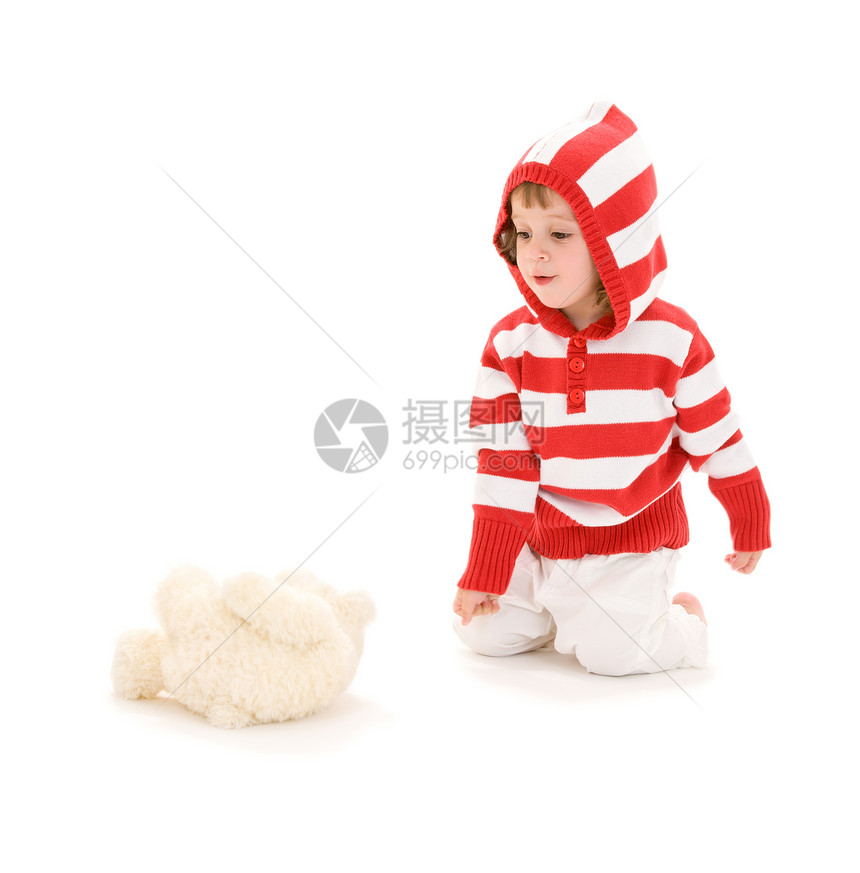 白色毛绒玩具的小女孩的照片图片