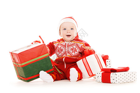 诞老人帮助婴儿与诞礼物超过白色图片