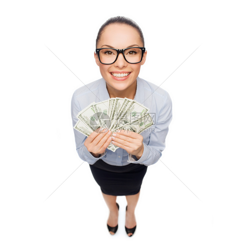 商业,货币银行微笑的女商人戴着眼镜,带着美元现金图片
