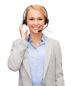 商业,技术呼叫中心友好的女帮助热线运营商与耳机图片