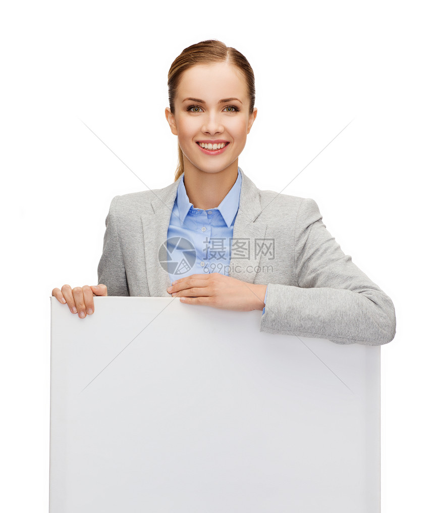 商业,办公室广告微笑的女商人与白色空白板图片