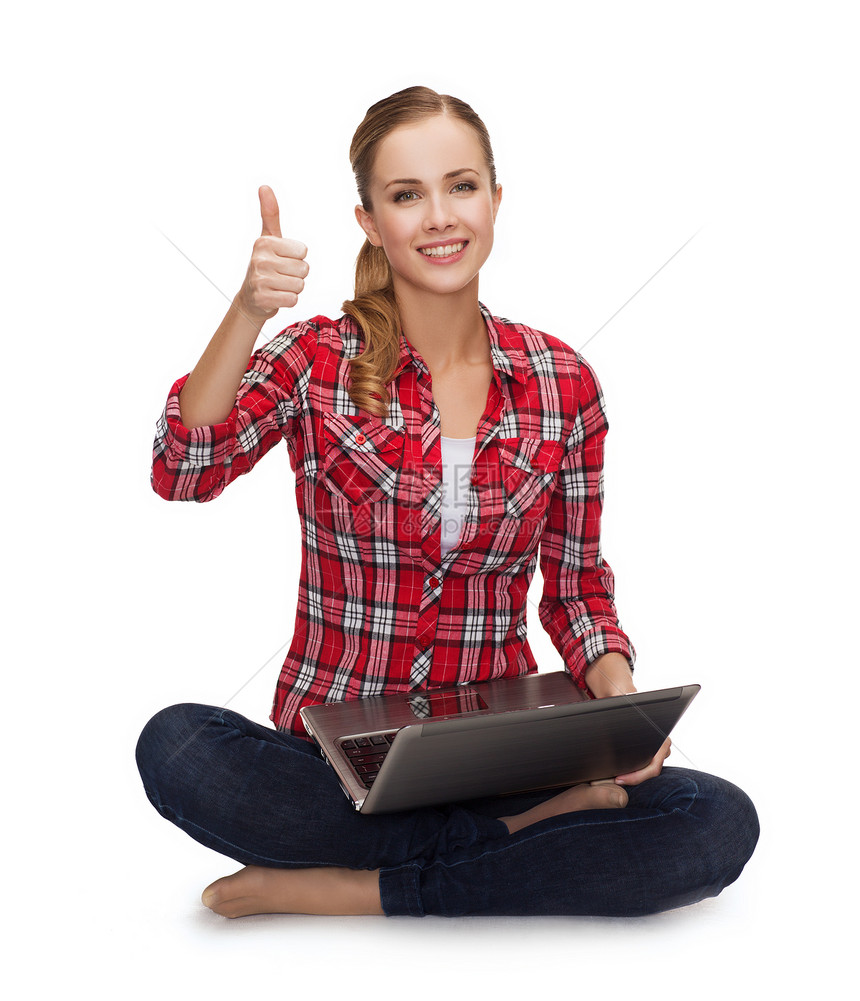 学校,教育,互联网技术轻女孩坐地板上,笔记本电脑竖大拇指图片