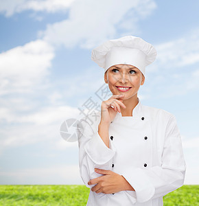 烹饪食物微笑的女厨师,厨师包师梦想图片