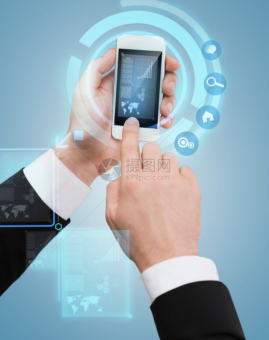 商业,互联网技术商人触摸智能手机屏幕图片