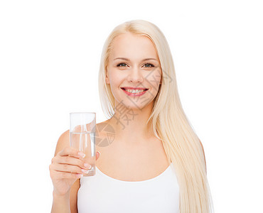 健康美丽的轻的微笑的女人带着杯水图片