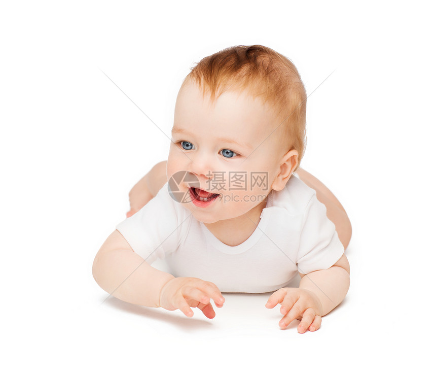 孩子蹒跚学步的微笑的婴儿躺地板上图片