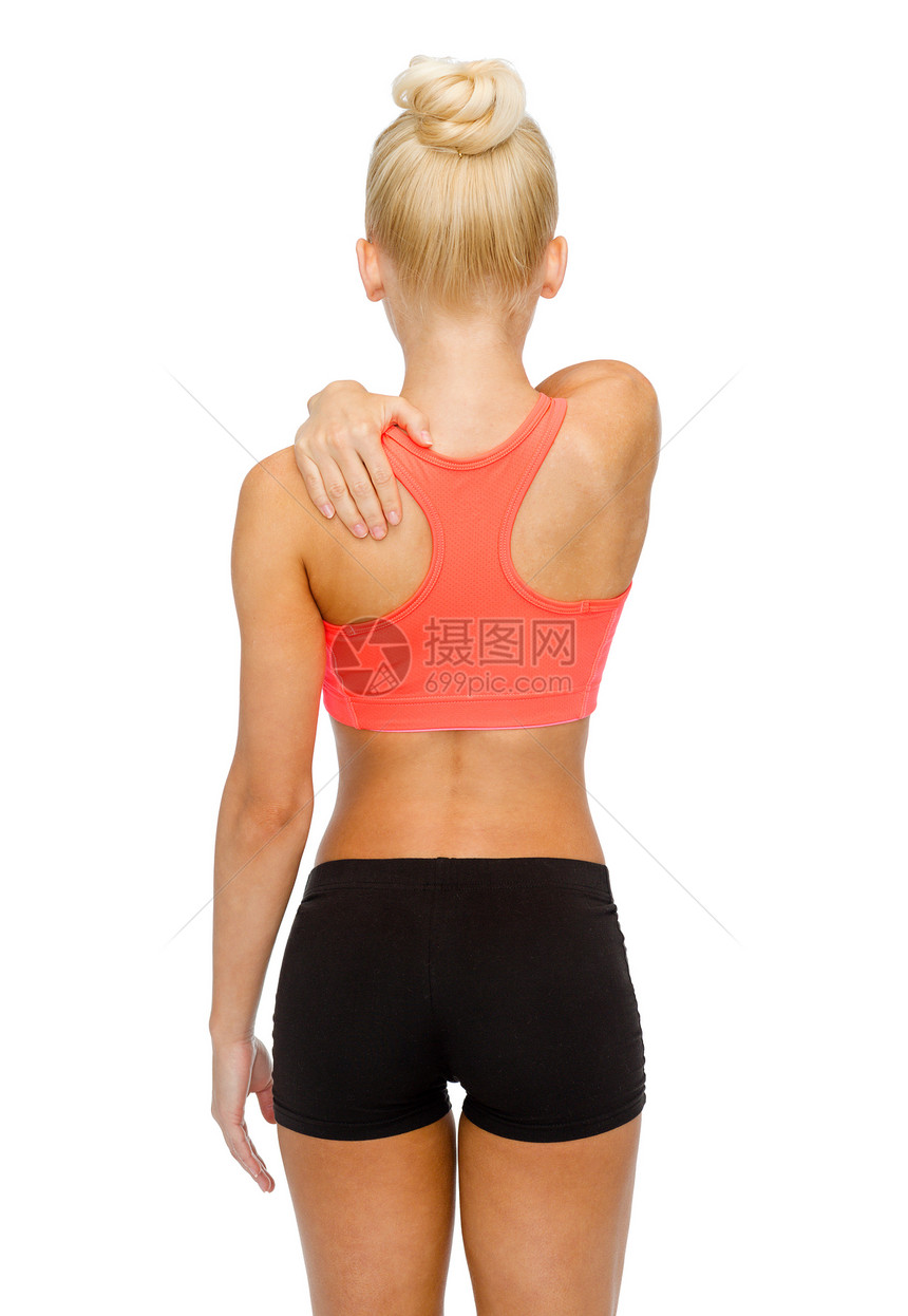 运动女触摸她的肩膀图片