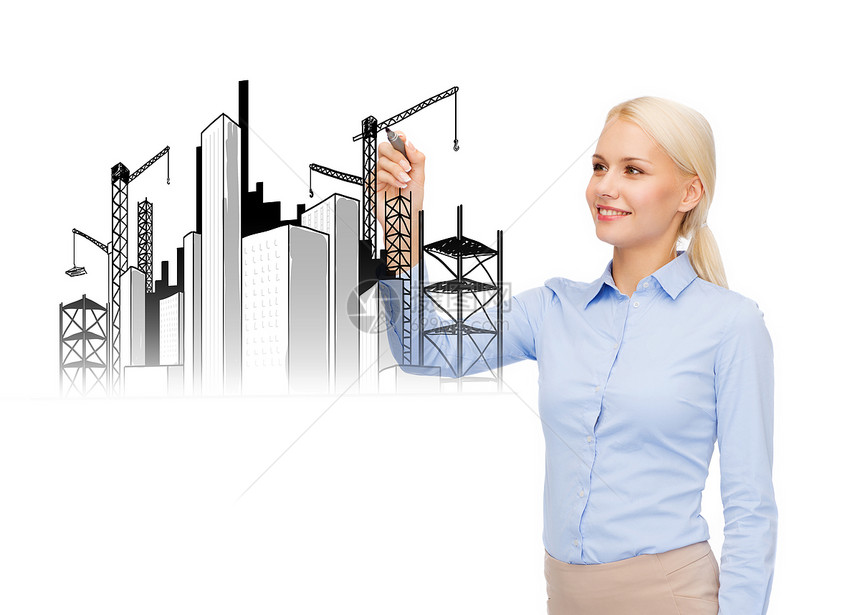 建筑建筑建筑工业女商人绘制建筑工地带标志的工业建筑图片
