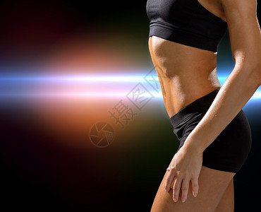 健身饮食美丽的运动女腹肌运动服背景图片