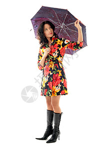 可爱的女孩穿着五颜六色的外套带着雨伞图片