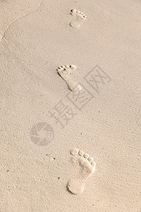 旅行,冒险海滩沙滩上的脚印图片