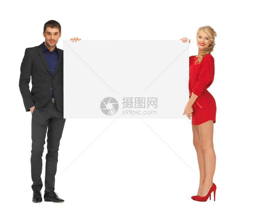 广告时尚微笑的夫妇持大空白白板图片