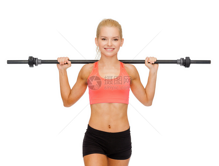 健身,运动运动微笑的运动女人用杠铃锻炼图片
