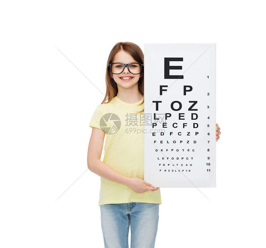 视觉,健康人的微笑的小女孩戴眼镜与眼睛检查图表图片