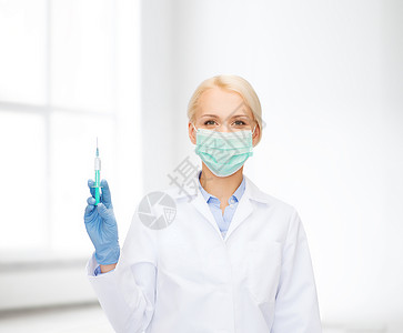 医疗保健医学女医生口罩持注射器与注射图片