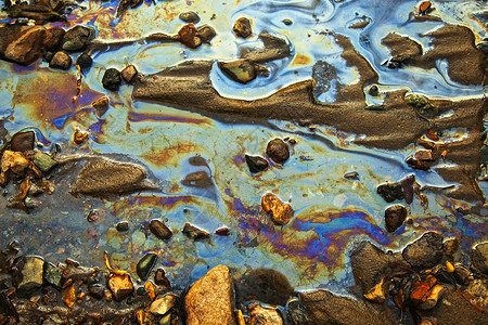 尾矿同颜色的汽油油块的水背景