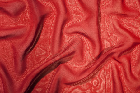 红色缎子丝绸的结构紧密背景图片