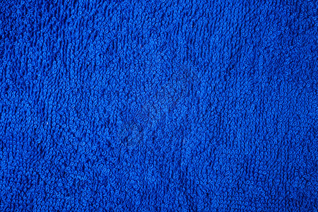 蓬松棉毛巾的质地深蓝色图片