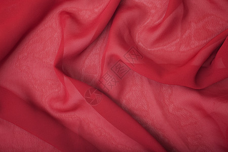 红色缎子丝绸的纹理特写背景图片