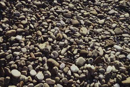 表覆盖灰色石头,圆形鹅卵石特写XA图片