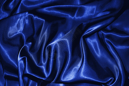 深蓝色丝绸特写的纹理图片