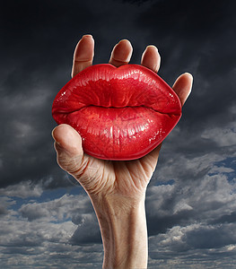 浪漫的爱情占激情关系的中,男的手握着红色的红宝石红色的女嘴唇,学放手情感监狱心理监禁的隐喻背景图片
