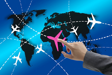 手触摸飞机与世界各地的路线,以商务旅行的图片