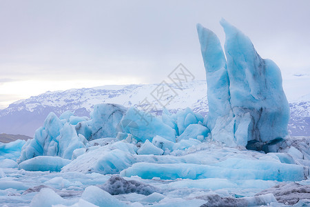 冰岛Vatnajokull冰川的Jokulsarlon泻湖冰川背景图片