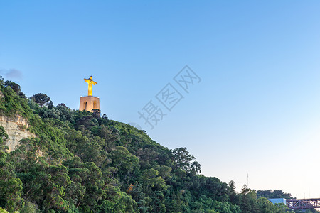 耶稣基督纪念碑Cristorei里斯本,葡萄牙日落背景图片