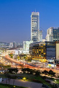 韩国首尔的HunginjimunDongdaemun门的城市景观背景图片