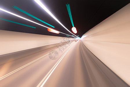 香港隧道内乘坐速度巴士模糊背景图片