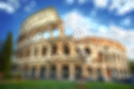 罗马竞技场自然模糊的背景罗马竞技场模糊的背景与自然的波基图片