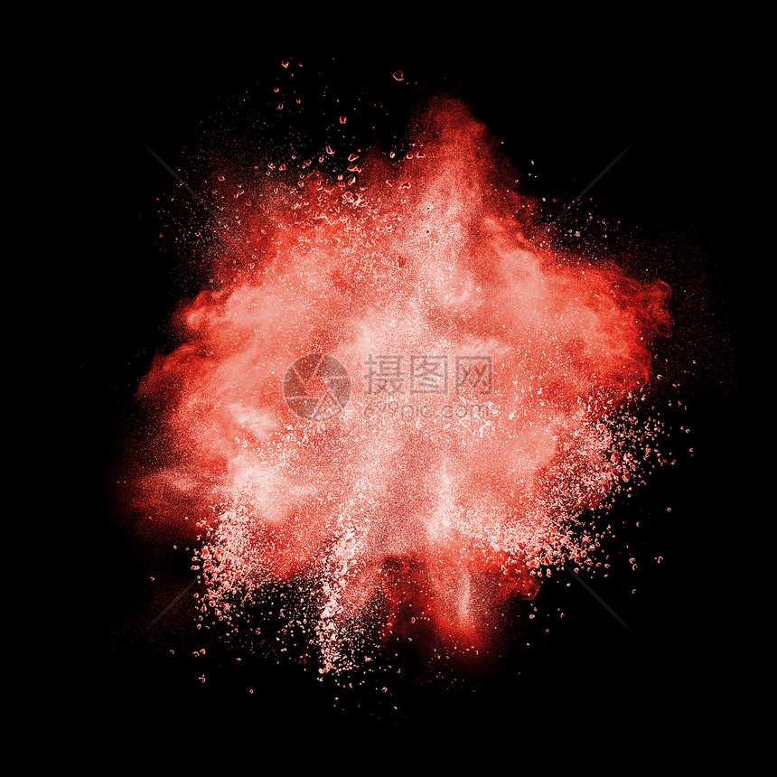 红色粉末爆炸隔离黑色背景上图片