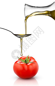 红色番茄倒油分离白色高清图片