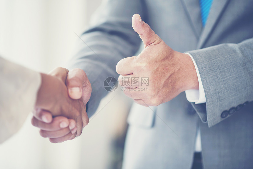 商人握手,完成次会议图片