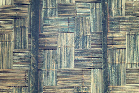 泰国本土风格的竹墙竹图案篮子手工制作背景图片