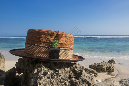 带海滩风景照片的靴子帽子带海滩景观的靴子帽子图片