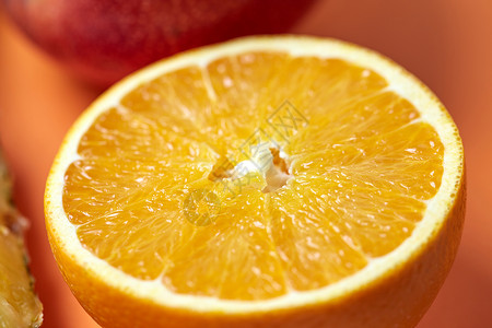 新鲜切片柑橘机橙色自然饮食,清爽特写背景新鲜切片柑橘橙镜头图片