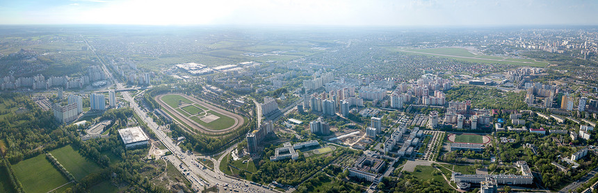 无人机基辅城市基础设施的空中全景城市微型区赛马场体育场街道朱利亚尼基辅希科斯基机场跑道城市娱乐活动区无人机上俯瞰图片