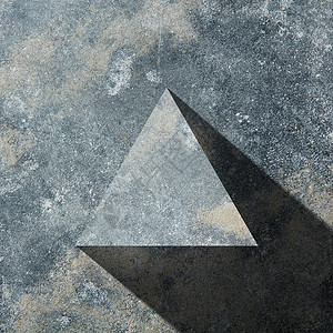 花岗岩三角形与阴影隔离暗石背景上,平躺花岗岩暗三角图片