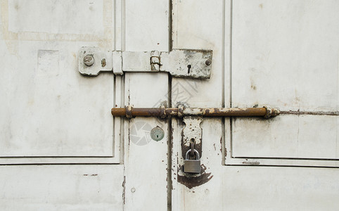 生锈的门锁背景图片