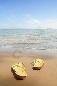 沙滩上的黄色沙滩背景图片