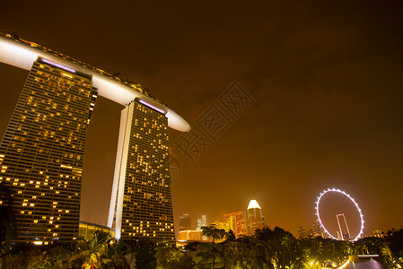黄昏的新加坡城市景观新加坡商业现代建筑景观围绕码头湾黄昏图片