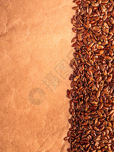 原纸健康饮食机营养棕色原亚麻籽亚麻籽边框纸背景上背景