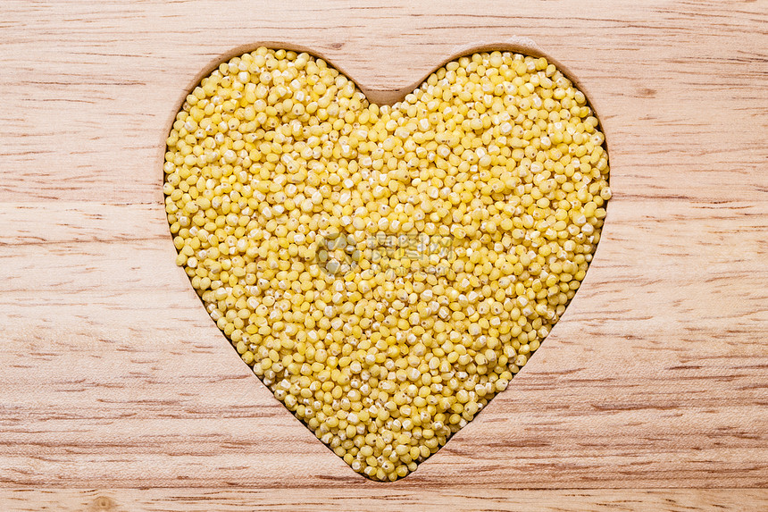 节食的小米木制表心脏健康的食物助于降低胆固醇图片