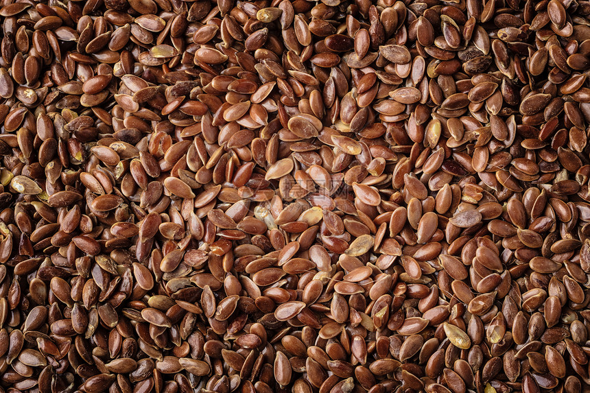 健康饮食机营养棕色亚麻籽亚麻籽天然食品背景图片