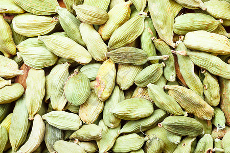 食物印度香气香料绿色豆荚堆背景纹理背景图片