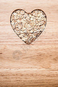 节食保健燕麦麦片心形木表降胆固醇的健康食品图片