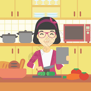包装刀板在厨房做健康沙拉的女人设计图片